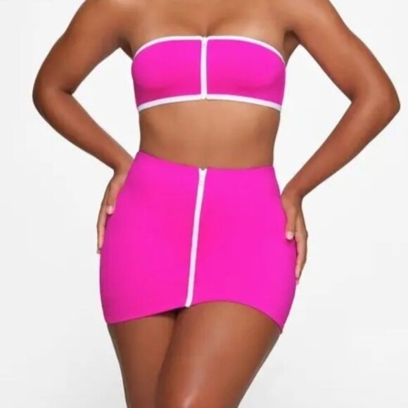 SKIMS Sporty Zipper Swim Mini Skirt in Hibiscus - Picture 1 of 8